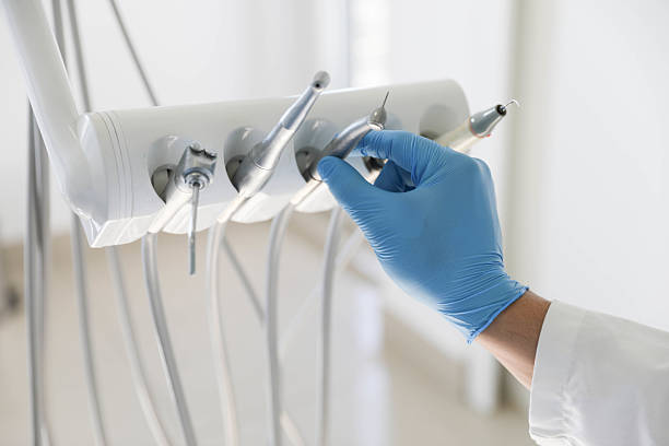 Professional Tooth Extraction technician working in Sheridan, OR
